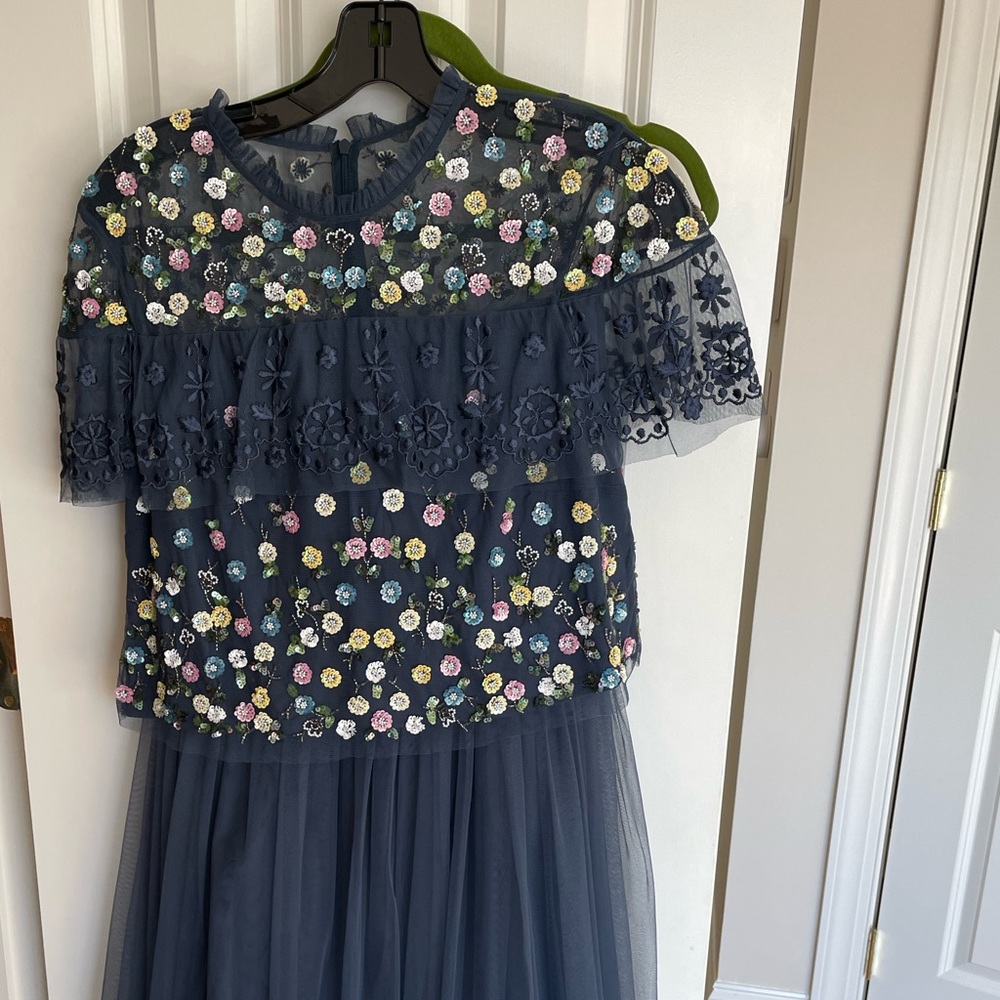 Tulle skirt with embellished top that falls a little over waistband